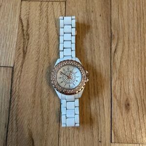 White XOXO watch with rose gold accents